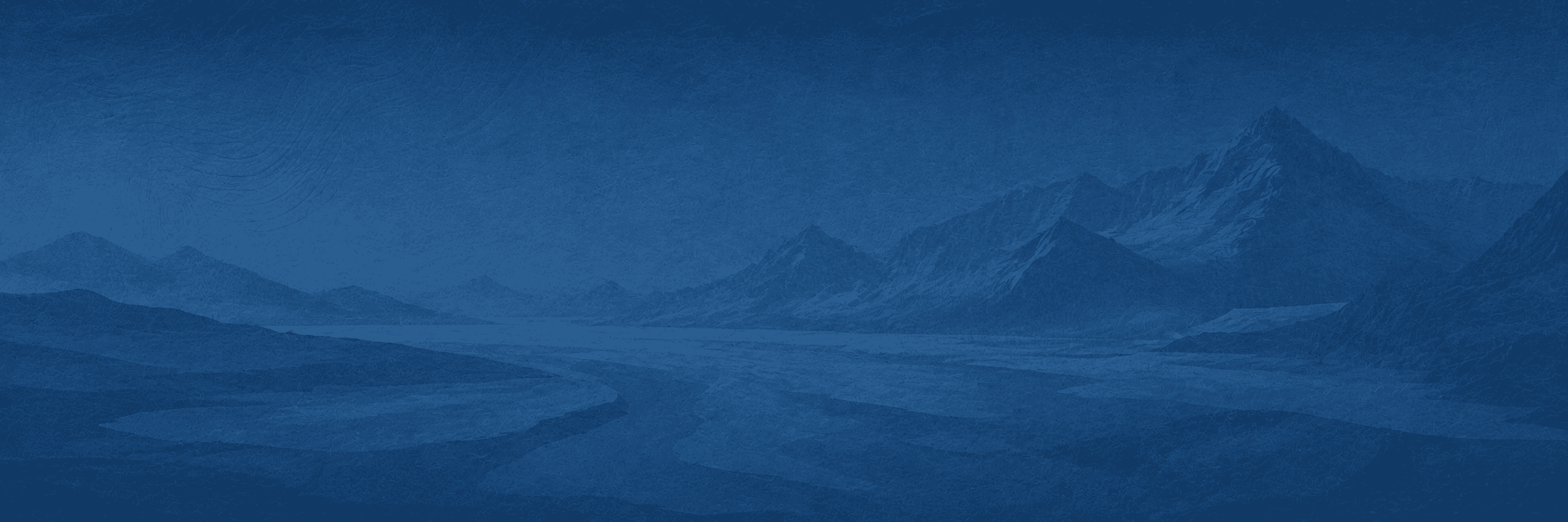 Paisaje de montañas y glaciares en tonos azules